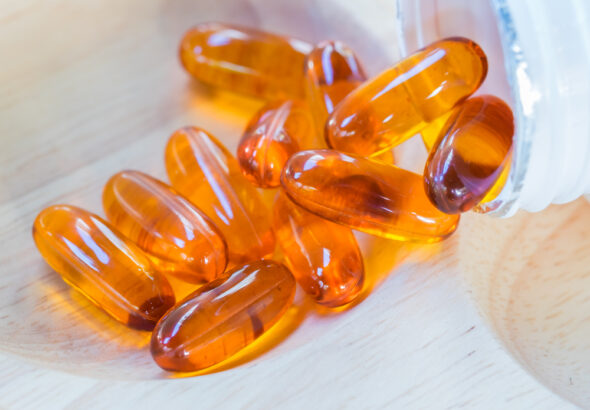 Golden fish oil softgel capsules