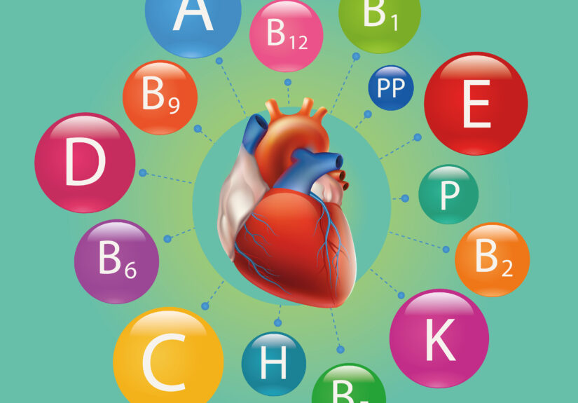 Illustration of vitamin letters arranged around a heart